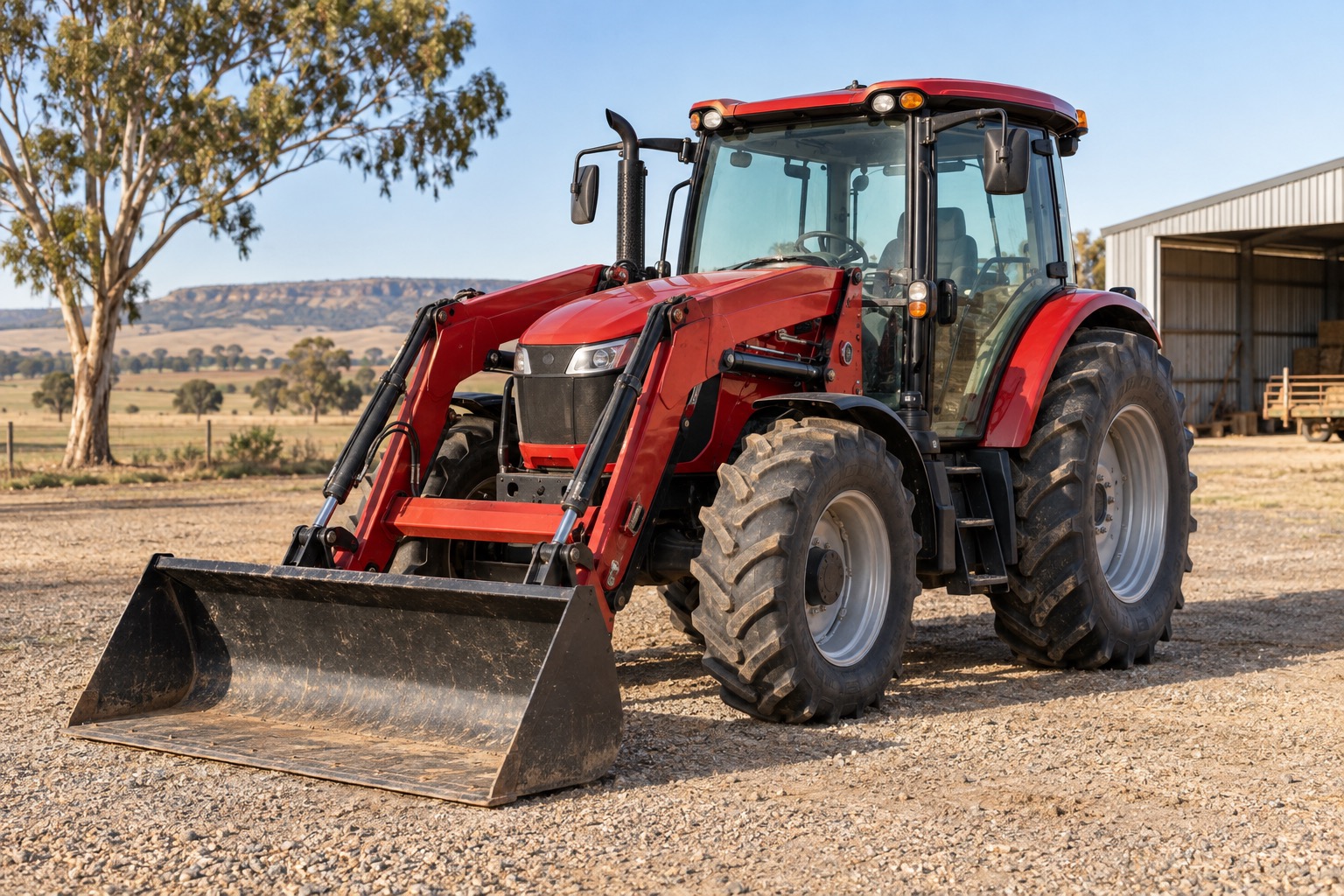 Tractor with a front loader in an Australian rural setting